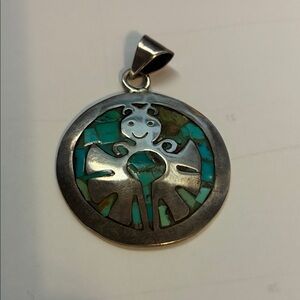 Chic Silver Pendant with Turquoise Inlay